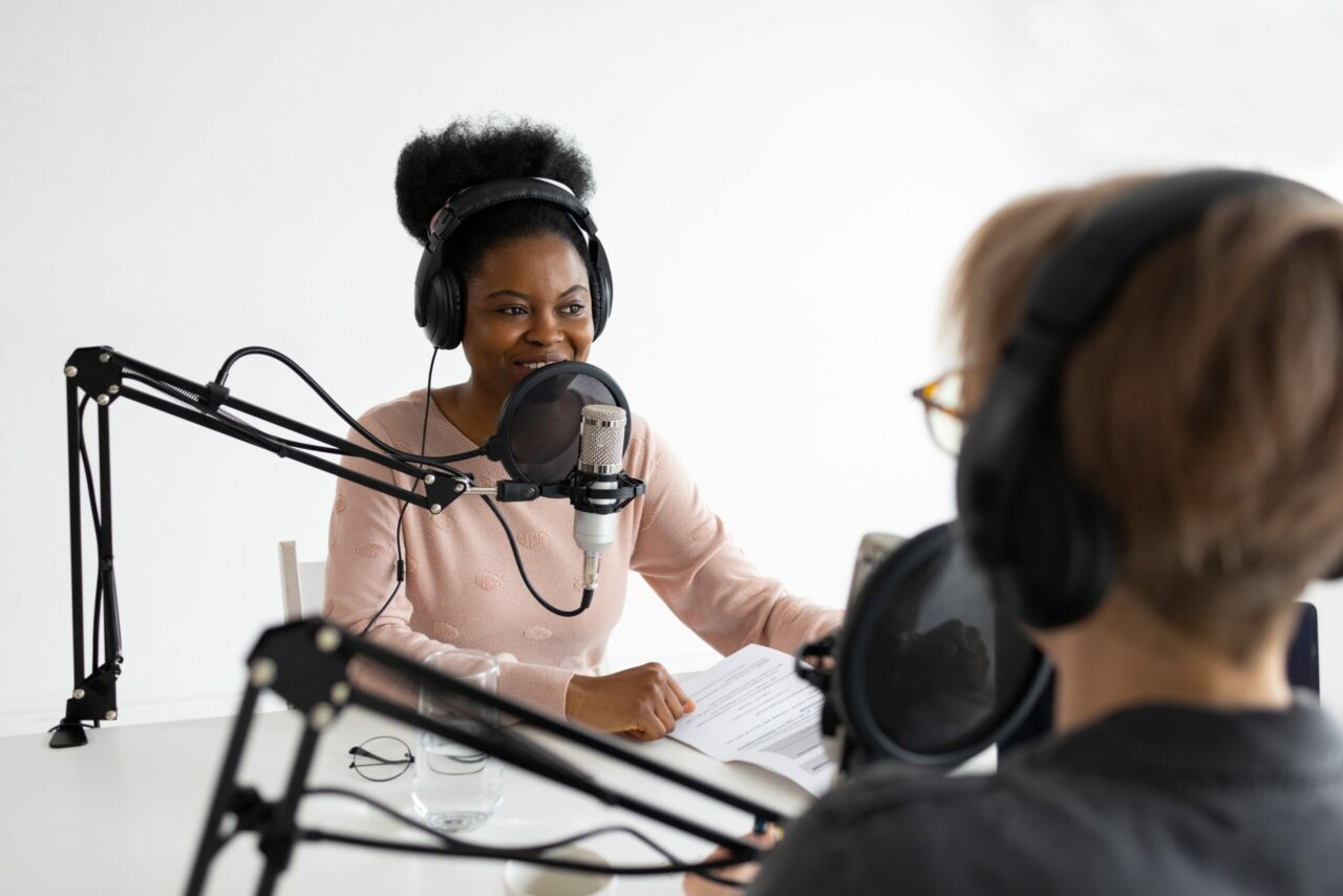 young-and-beautiful-african-american-woman-in-recording-studio-recording-podcast-or-radio-show-black_t20_wk0NBe